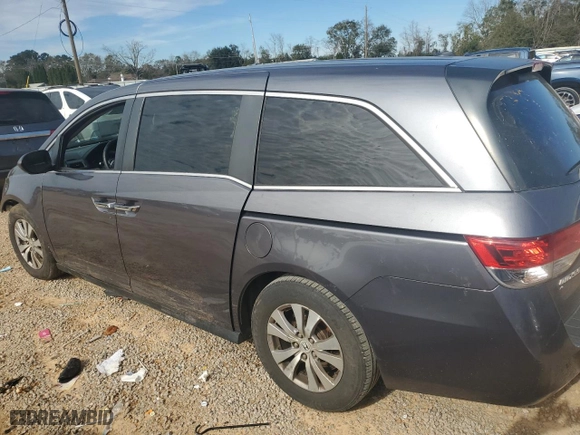 2016 Honda Odyssey EX-L with VIN 5FNRL5H61GB094731, listed as a Copart auction lot 87867085 with 243,837 mi miles and Salvage Title. Bid and sale history available at carsss.com. Image 2.