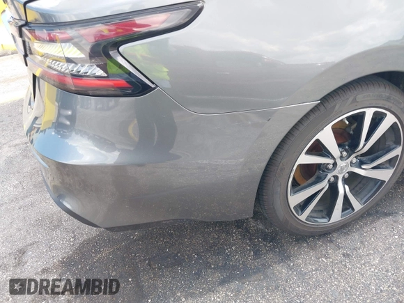 2020 Nissan Maxima SV z VIN 1N4AA6CV6LC373659, wystawiony jako IAAI lot #42347264 z przebiegiem 77 812 mil mil oraz . Historia ofert i sprzedaży dostępna na DreamBid. Obrazek 17.