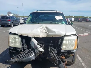 2004 Cadillac Escalade EXT z VIN 3GYEK62N34G304883, wystawiony jako IAAI lot #42149493 z przebiegiem 177 911 mil mil oraz . Historia ofert i sprzedaży dostępna na DreamBid. Obrazek 12.