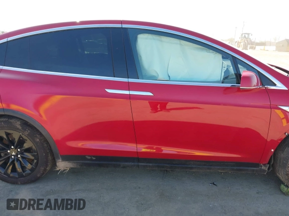 2016 Tesla Model X 70D z VIN 5YJXCAE27GF021994, wystawiony jako IAAI lot #41976475 z przebiegiem 70 771 mil mil oraz . Historia ofert i sprzedaży dostępna na DreamBid. Obrazek 14.