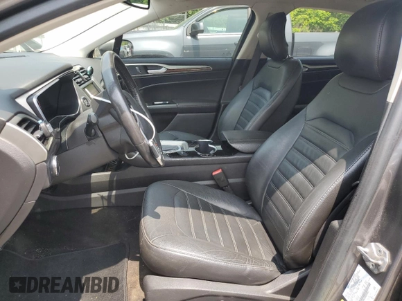 2014 Ford Fusion SE Hybrid with VIN 3FA6P0LU9ER289817, listed as a Copart auction lot 60909615 with 168,884 mi miles and Salvage title. Bid and sale history available at DreamBid. Image 7.