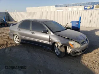 2005 Mitsubishi Lancer with VIN JA3AJ66F25U016375, listed as a Copart auction lot 73584514 with 202,752 mi miles and Clean Title. Bid and sale history available at DreamBid. Image 4.