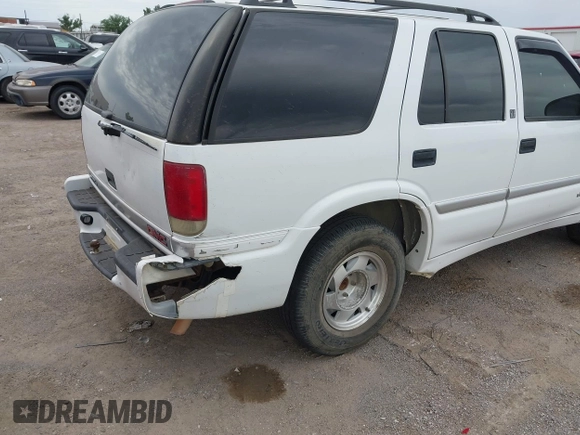 2001 GMC Jimmy SLE z VIN 1GKCS13W312208879, wystawiony jako IAAI lot #42284916 z przebiegiem 204 219 mil mil oraz . Historia ofert i sprzedaży dostępna na DreamBid. Obrazek 6.