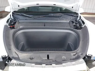 2023 Tesla Model Y Long Range with VIN 7SAYGAEE0PF787216, listed as a IAAI auction lot 41589954 with 17,985 mi miles and . Bid and sale history available at DreamBid. Image 10.
