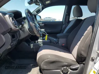 2018 Toyota Tacoma SR with VIN 3TMCZ5AN6JM129370, listed as a Copart auction lot 63042425 with 65,189 mi miles and Salvage title. Bid and sale history available at DreamBid. Image 7.