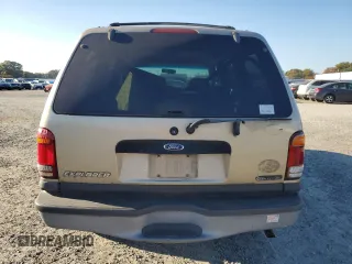1999 Ford Explorer XL with VIN 1FMZU34X2XUA28059, listed as a Copart auction lot 77668294 with 131,064 mi miles and Salvage title. Bid and sale history available at DreamBid. Image 6.
