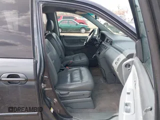 2003 Honda Odyssey EX-L with VIN 5FNRL18903B090800, listed as a IAAI auction lot 41843858 with 201,393 mi miles and . Bid and sale history available at DreamBid. Image 5.