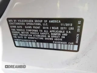 2013 Volkswagen Passat SEL Premium z VIN 1VWCP7A33DC071818, wystawiony jako IAAI lot #41905651 z przebiegiem 172 911 mil mil oraz . Historia ofert i sprzedaży dostępna na DreamBid. Obrazek 9.