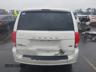 2012 Dodge Grand Caravan SXT with VIN 2C4RDGCG4CR304472, listed as a IAAI auction lot 41396437 with 180,309 mi miles and . Bid and sale history available at DreamBid. Image 16.