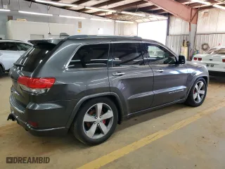 2014 Jeep Grand Cherokee Overland with VIN 1C4RJFCT2EC137511, listed as a Copart auction lot 49499545 with 211,173 mi miles and Clean Title. Bid and sale history available at carsss.com. Image 3.