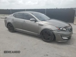 2013 Kia Optima SX with VIN 5XXGR4A62DG116593, listed as a Copart auction lot 59696705 with 120,248 mi miles and Salvage title. Bid and sale history available at DreamBid. Image 4.