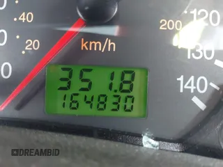 2007 Ford Focus S z VIN 1FAHP37N47W278284, wystawiony jako IAAI lot #42246383 z przebiegiem 164 830 mil mil oraz . Historia ofert i sprzedaży dostępna na DreamBid. Obrazek 16.