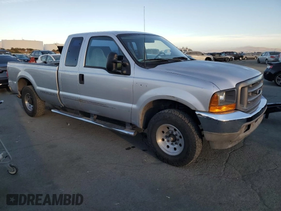 1999 Ford Super Duty F-250 XL with VIN 1FTNX20F3XED60894, listed as a Copart auction lot 74849284 with 148,779 mi miles and Salvage Title. Bid and sale history available at carsss.com. Image 4.