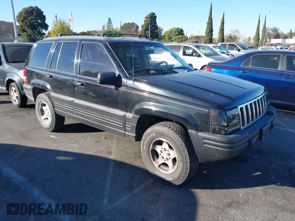 1998 Jeep Grand Cherokee Laredo with VIN 1J4FX58S8WC121904, listed as a IAAI auction lot 41145207 with 222,134 mi miles. Bid and sale history available at carsss.com. Image 1.