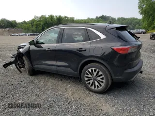 2020 Ford Escape Titanium с VIN 1FMCU9J97LUA20595, выставлен на аукционе Copart как лот 59476745 с пробегом 74 518 миль миль и Списание • Salvage title. История ставок и продаж доступна на DreamBid. Изображение 2.