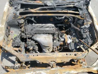 2004 Toyota Camry LE z VIN JTDBE32K740250691, wystawiony jako Copart lot #55793225 z przebiegiem Nie podano mil oraz Szkoda całkowita • Salvage title. Historia ofert i sprzedaży dostępna na DreamBid. Obrazek 11.