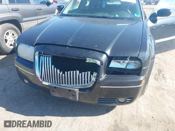2005 Chrysler 300 with VIN 2C3JA53G55H122612, listed as a IAAI auction lot 41971677 with Not Provided miles. Bid and sale history available at carsss.com. Image 6.