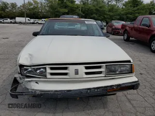 1991 Oldsmobile Delta z VIN 1G3HN54C1M1804698, wystawiony jako Copart lot #69833034 z przebiegiem 174 625 mil mil oraz Szkody całkowita. Historia ofert i sprzedaży dostępna na DreamBid. Obrazek 5.