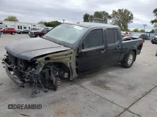 2015 Nissan Frontier SV with VIN 1N6AD0FRXFN722101, listed as a Copart auction lot 76144314 with 87,902 mi miles and Salvage title. Bid and sale history available at DreamBid. Image 1.