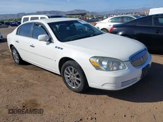 2009 Buick Lucerne CXL with VIN 1G4HD57M19U109257, listed as a IAAI auction lot 42064449 with 153,665 mi miles. Bid and sale history available at carsss.com. Image 1.