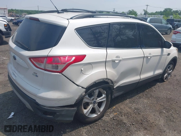 2013 Ford Escape SE z VIN 1FMCU9GXXDUD82847, wystawiony jako IAAI lot #42436360 z przebiegiem 142 071 mil mil oraz . Historia ofert i sprzedaży dostępna na DreamBid. Obrazek 4.