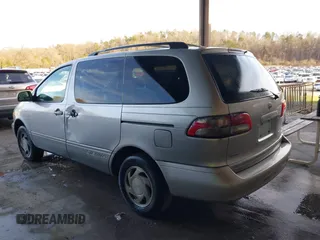 2002 Toyota Sienna LE with VIN 4T3ZF13C72U422993, listed as a IAAI auction lot 41552421 with 260,014 mi miles. Bid and sale history available at carsss.com. Image 3.