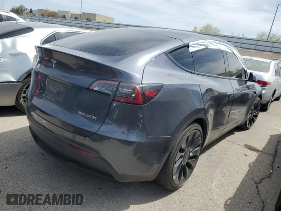 2022 Tesla Model Y Performance with VIN 7SAYGDEF1NF491967, listed as a Copart auction lot 51119515 with 50,520 mi miles and Salvage title. Bid and sale history available at DreamBid. Image 3.
