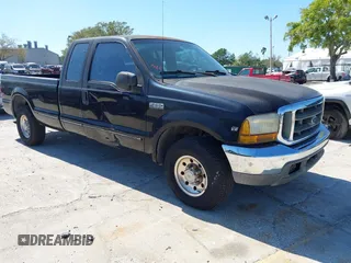 1999 Ford Super Duty F-250 XL with VIN 1FTNX20LXXEA49775, listed as a IAAI auction lot 41825626 with 141,767 mi miles. Bid and sale history available at carsss.com. Image 1.