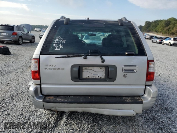 2001 Isuzu Rodeo S with VIN 4S2CK58W114317183, listed as a Copart auction lot 76280974 with 318,201 mi miles and Non Repairable. Bid and sale history available at DreamBid. Image 6.