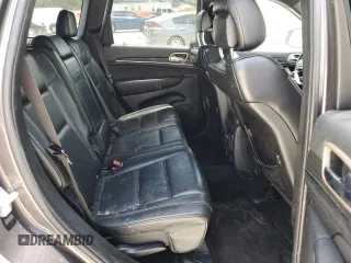 2014 Jeep Grand Cherokee Overland with VIN 1C4RJFCT7EC182234, listed as a Copart auction lot 54754465 with 185,658 mi miles and Salvage Title. Bid and sale history available at DreamBid. Image 11.
