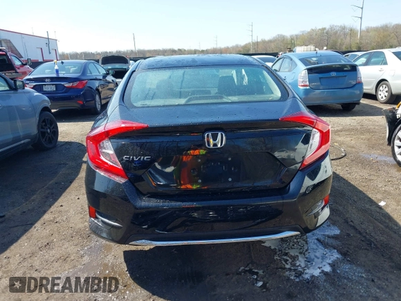 2020 Honda Civic LX with VIN 2HGFC2F69LH532499, listed as a IAAI auction lot 41919941 with 96,936 mi miles and . Bid and sale history available at DreamBid. Image 17.