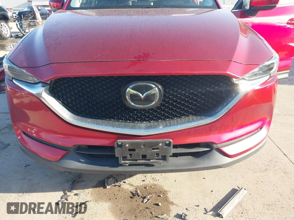 2020 Mazda CX-5 Grand Touring with VIN JM3KFADM7L0729537, listed as a IAAI auction lot 41864569 with 82,998 mi miles. Bid and sale history available at carsss.com. Image 13.