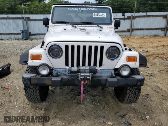 2000 Jeep Wrangler Sahara with VIN 1J4FA59SXYP760278, listed as a Copart auction lot 60402485 with 192,161 mi miles and Salvage title. Bid and sale history available at DreamBid. Image 5.