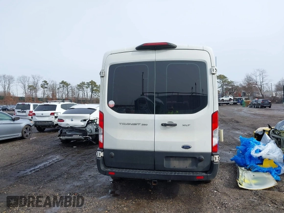 2019 Ford Transit Passenger XL with VIN 1FBAX2CM0KKA23414, listed as a IAAI auction lot 41414158 with 481,235 mi miles and . Bid and sale history available at carsss.com. Image 16.