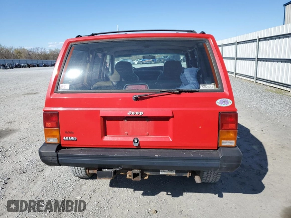 1995 Jeep Cherokee Sport with VIN 1J4FJ68S2SL666126, listed as a Copart auction lot 50496735 with 158,523 mi miles and Salvage title. Bid and sale history available at DreamBid. Image 6.