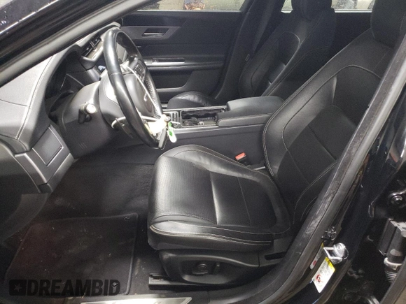 2017 Jaguar XF with VIN SAJBL4BV4HCY47941, listed as a Copart auction lot 77104404 with 73,839 mi miles and Salvage Title. Bid and sale history available at DreamBid. Image 7.