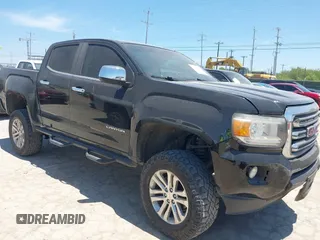 2017 GMC Canyon 2WD SLT z VIN 1GTG5DEN0H1215315, wystawiony jako IAAI lot #42247267 z przebiegiem 132 509 mil mil oraz . Historia ofert i sprzedaży dostępna na DreamBid. Obrazek 1.