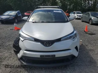 2018 Toyota C-HR XLE with VIN NMTKHMBX9JR060424, listed as a Copart auction lot 57913775 with 104,847 mi miles and Salvage title. Bid and sale history available at DreamBid. Image 5.