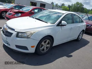 2014 Chevrolet Cruze 1LT with VIN 1G1PC5SB4E7132171, listed as a IAAI auction lot 42532531 with 132,012 mi miles and . Bid and sale history available at DreamBid. Image 2.