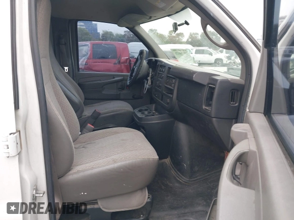 2012 Chevrolet Express Cargo z VIN 1GCWGFCA7C1201373, wystawiony jako IAAI lot #42414621 z przebiegiem 181 807 mil mil oraz . Historia ofert i sprzedaży dostępna na DreamBid. Obrazek 5.