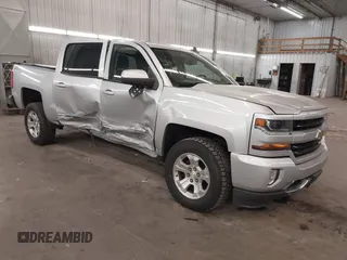 2017 Chevrolet Silverado 1500 LT with VIN 3GCUKREC5HG318772, listed as a IAAI auction lot 42056116 with 82,987 mi miles and . Bid and sale history available at DreamBid. Image 1.