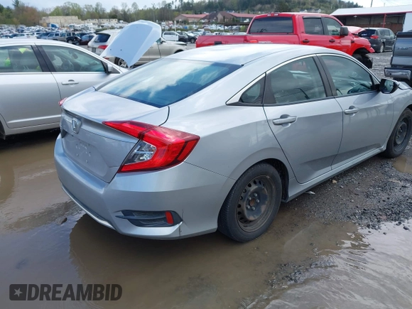 2019 Honda Civic LX with VIN 19XFC2F61KE009471, listed as a IAAI auction lot 42017532 with 81,134 mi miles and . Bid and sale history available at DreamBid. Image 4.