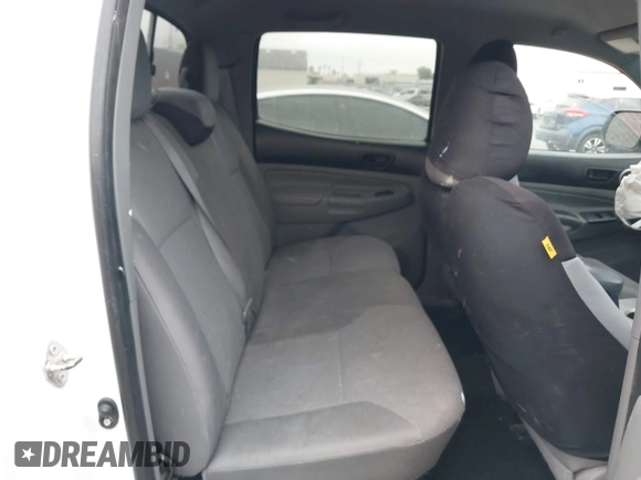 2014 Toyota Tacoma PreRunner z VIN 3TMJU4GN3EM170360, wystawiony jako IAAI lot #42438394 z przebiegiem 223 101 mil mil oraz . Historia ofert i sprzedaży dostępna na DreamBid. Obrazek 8.