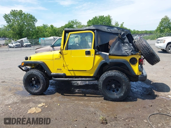 2005 Jeep Wrangler Sport with VIN 1J4FA49S65P381798, listed as a IAAI auction lot 42305109 with 71,880 mi miles and . Bid and sale history available at DreamBid. Image 14.