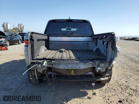 2022 Rivian R1T Adventure z VIN 7FCTGAAA0NN010103, wystawiony jako Copart lot #53312035 z przebiegiem 48 333 mil mil oraz Szkody całkowita. Historia ofert i sprzedaży dostępna na DreamBid. Obrazek 6.