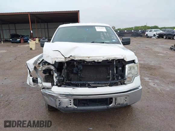 2014 Ford F-150 XL with VIN 1FTNF1CF6EKD20896, listed as a IAAI auction lot 41952023 with 102,921 mi miles and . Bid and sale history available at DreamBid. Image 12.