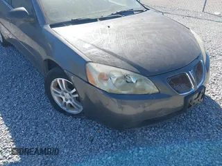 2005 Pontiac G6 with VIN 1G2ZG528X54155887, listed as a IAAI auction lot 41847177 with 118,816 mi miles and . Bid and sale history available at DreamBid. Image 6.
