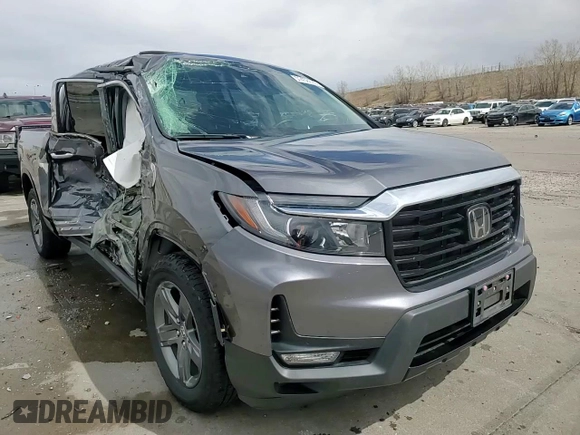 2023 Honda Ridgeline RTL-E with VIN 5FPYK3F78PB010961, listed as a Copart auction lot 51458635 with 33,508 mi miles and Salvage title. Bid and sale history available at DreamBid. Image 13.