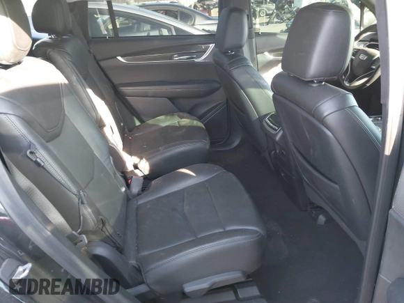 2020 Cadillac XT6 AWD Sport with VIN 1GYKPGRS1LZ170931, listed as a IAAI auction lot 40656458 with 80,168 mi miles and . Bid and sale history available at DreamBid. Image 8.