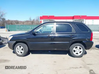 2007 Kia Sportage LX with VIN KNDJF724877313178, listed as a IAAI auction lot 41863492 with 199,138 mi miles. Bid and sale history available at carsss.com. Image 14.